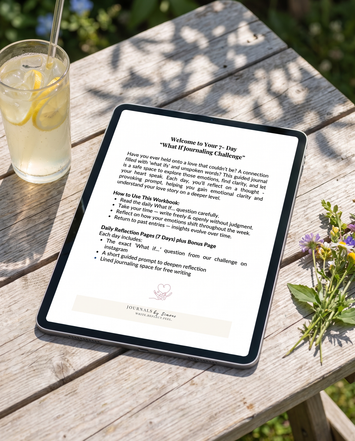 What If... 7-Day Guided Journal, Welcome and How to Use This Workbook page shown on iPad at a garden picnic table